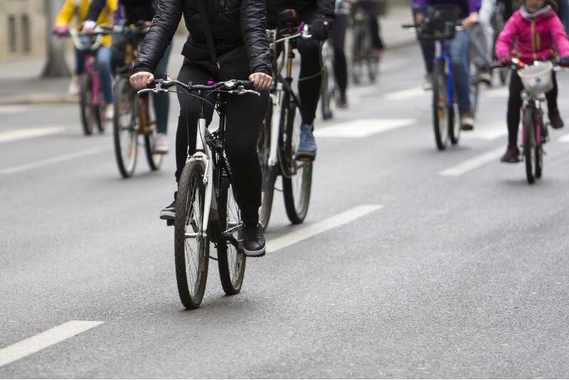 group of cyclists on a city street